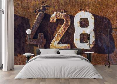 Metal digits on rusty iron plate Wall mural