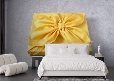 yellow gift box with bow Wall mural