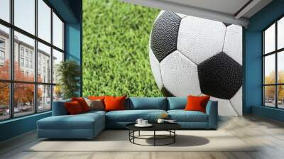 Close-up of Soccer Ball on Grass Clean, Crisp Sports Focusing on Details and Dynamics Wall mural