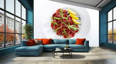 Dried Italian Beef Bresaola with Lemon and Greens Isolated Wall mural