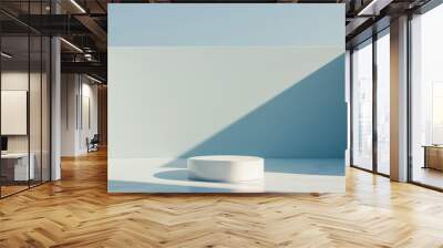 Minimalist White Podium on Monochromatic Blue Background for Product Display in Bright Natural Light Wall mural