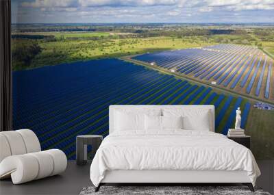 Aerial top view of a solar pannels power plant. Wall mural