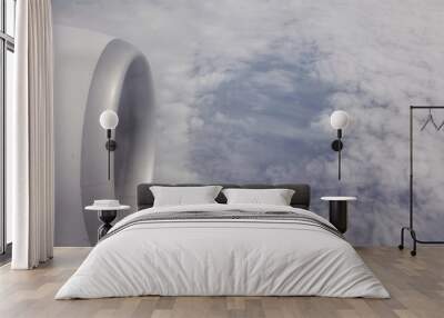 View of beautiful cloud and wing of airplane Wall mural