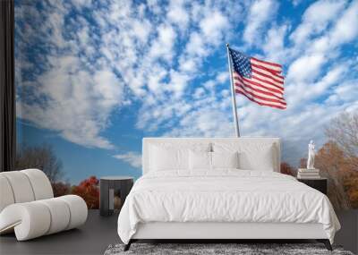 Vibrant Autumn Trees and American Flag Against Blue Sky Wall mural