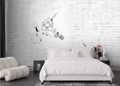 Two young people dreaming about a new home better. Wall mural