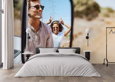 Couple on road trip, smile in car mirror reflection and happy smile with love on desert holiday road trip drive in South Africa. Summer vacation in the wild, diverse male and female friends with fun Wall mural