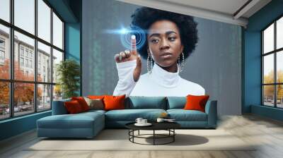 Futuristic, hologram and black woman with technology in a studio for digital tech innovation. Future, modern and young African girl model with 3d graphic metaverse overlay isolated by gray background Wall mural