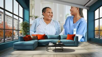 Getting this understood. Shot of a nurse speaking to her female patient. Wall mural