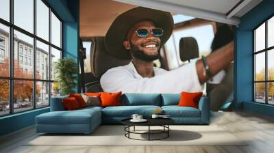 Travel, road trip and happy black man driving a caravan on a summer vacation, journey or adventure. Happiness, freedom and African guy with a smile on a drive to a holiday destination in Wall mural