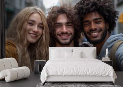 A group of tourists are smiling and posing for selfies on the street. Wall mural