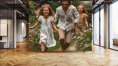 Happy family running in the park Laugh and have fun together on a holiday at home. Wall mural