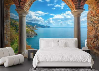 View from the stone arch windows of the ancient monastery overlooking the sea and cliffs. Wall mural