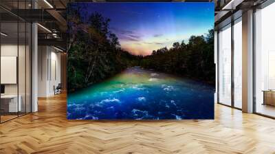 A mystical night at a rest are in the middle of the woods overlooking a river flowing through in the middle of nowhere Oregon, USA. Wall mural