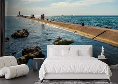 A pier in Lake Michigan in southern western coast of Michigan, USA at high noon. Wall mural