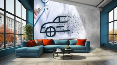 doctor holds a stethoscope and examines a car Wall mural