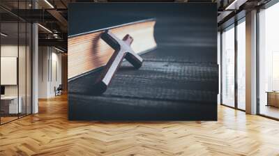 open book and cross on the table Wall mural