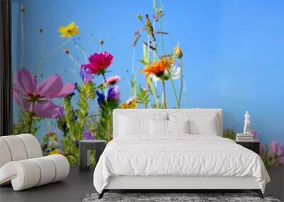 colorful wildflower meadow with blue sky and sunshine - floral summer background banner with copy space Wall mural