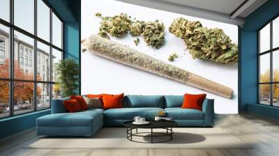 Marijuana flower and rolled joint on white background  Wall mural