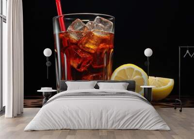 ice cold coke in a glass with ice cubes, drinking straw and lemon slices Wall mural