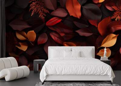 A vibrant arrangement of autumn leaves in shades of red, orange, and black. The leaves are varied in shape and size, creating a rich texture and depth.  Wall mural