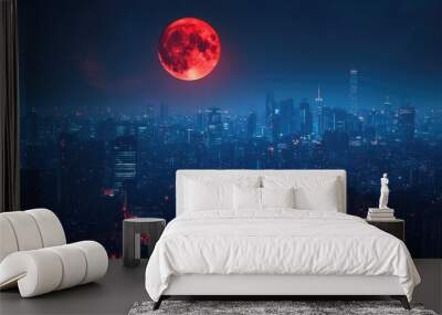 A panoramic view of a red moon above a bustling cityscape, with lights and shadows creating a dramatic effect, perfect for urban and celestial themes with ample copy space. Wall mural