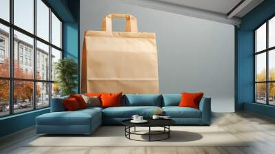 Classic takeout bag with copy space, showcasing a simple design with space for a logo or message. Wall mural