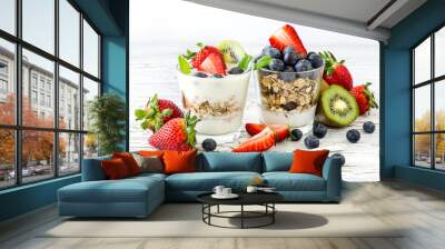 healthy breakfast with muesli in glass, fresh berries and yogurt Wall mural