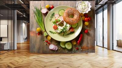 Vegetarian bagel sandwich with fresh veggies and arugula salad,healthy snack Wall mural