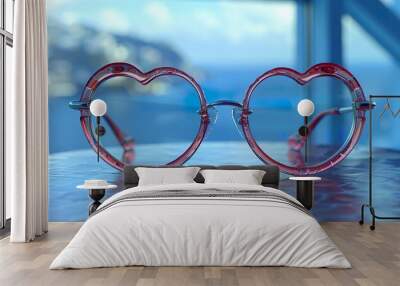 A pair of heart shaped glasses placed on a table Wall mural