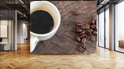 caffee cup and coffee beans on a rustic wooden background Wall mural