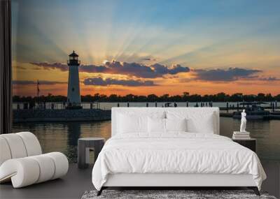 Sensational Sunset with a Lighthouse at a Marina Wall mural