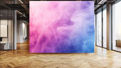 Colorful pink and blue smoke swirls create an abstract background at dusk Wall mural