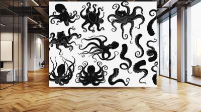 Black octopus silhouette set isolated on white background Wall mural