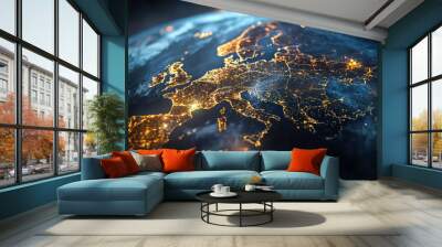 A close-up of Europe at night, with city lights illuminating the continent. Wall mural