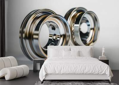 Two metallic rings with different size, depth and texture on a white background. Wall mural