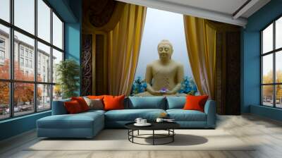 Ancient statue of sitting in meditation Buddha in the temple of Sri Lanka. Wall mural