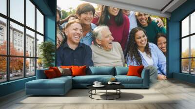 Crowd of multi generational people having fun together at city park - Multiracial community and social inclusion concept Wall mural