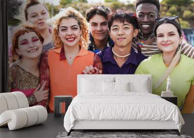 Group of young multiracial people wearing trendy retro style clothes while smiling on camera Wall mural