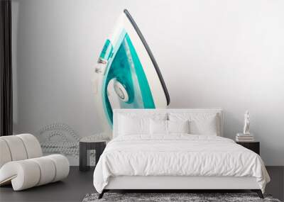 modern new electric iron on white background, ironing, clothes, housework and objects concept Wall mural