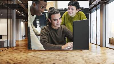 Young diverse students learning together inside computer class room Wall mural