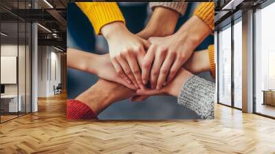 Teamwork, unity concept, group of friends put their hands together with copy space
 Wall mural