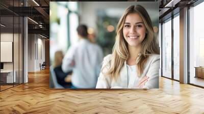 Young and confident businesswoman stand crossed arms with office background Wall mural