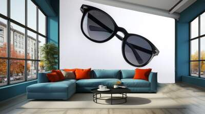 Black Sunglasses floating or flying isolated white background Wall mural