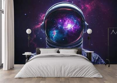 Astronaut exploring the cosmos with vibrant galaxies and nebulae reflected in the helmet Wall mural