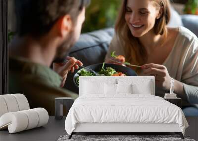 Couple Enjoying a Healthy Salad Together During a Meal at Home Wall mural