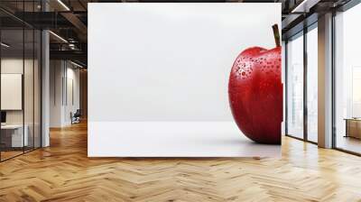 Spotlight on freshness: A solitary, ripe red apple isolated on a white backdrop Wall mural