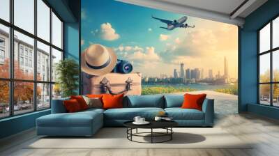 A suitcase with a hat and camera ready to travel Wall mural