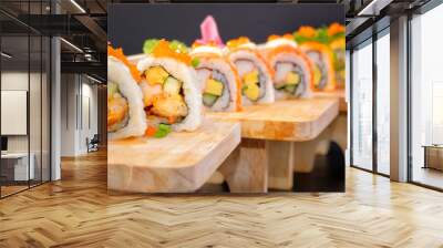 Japanese Cuisine - Sushi Roll on wood plate in white background Wall mural