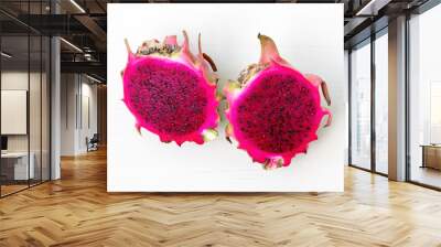 Fresh red dragon fruit cut into two pieces on white background. Wall mural