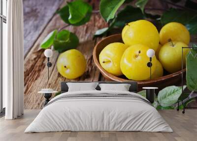 Ripe yellow plums Wall mural